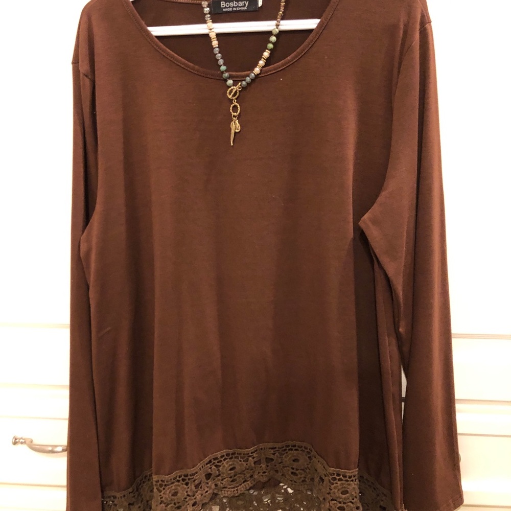 Brown top with detailed hem